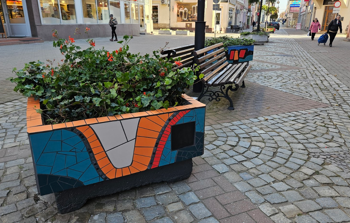 Colorful flower pots at Wrocławska street in Dzierżoniów.