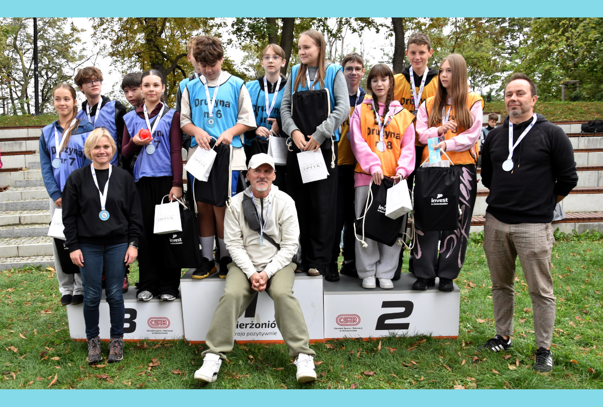 The Enterprising Dzierżoniów field game. The winners of 1st, 2nd, and 3rd place are on the podium.