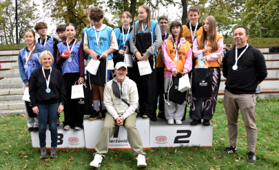 The Enterprising Dzierżoniów field game. The winners of 1st, 2nd, and 3rd place are on the podium.